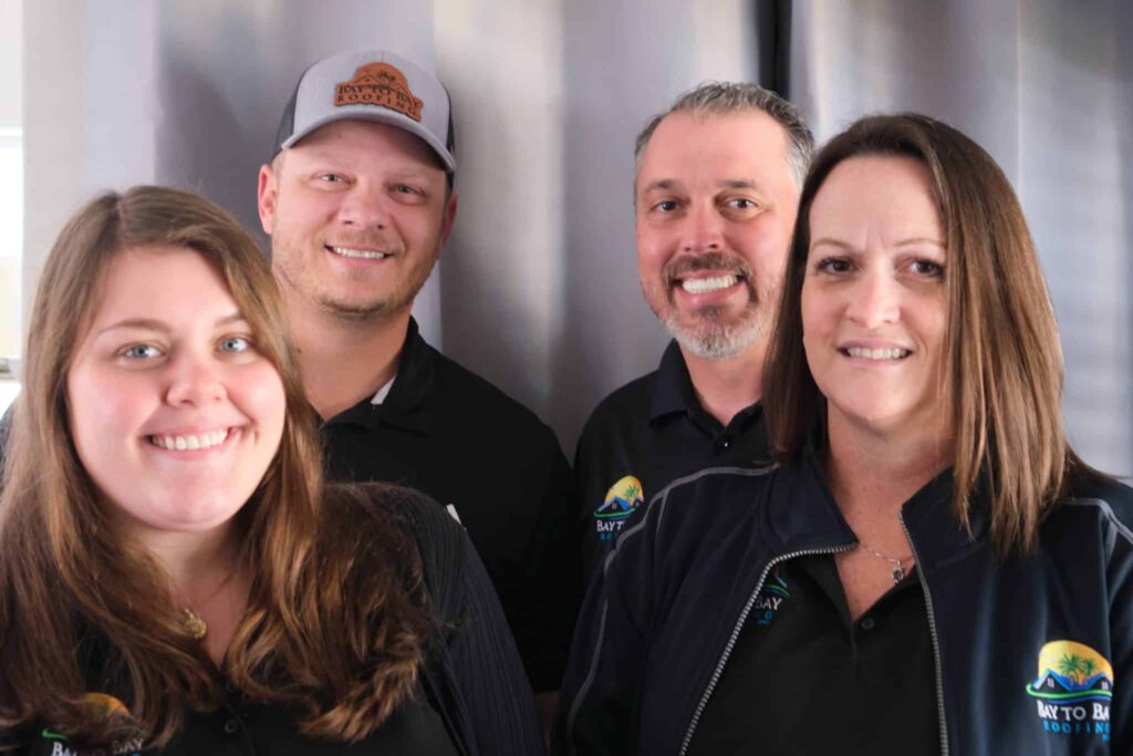 Bay to Bay Roofing crew members on site
